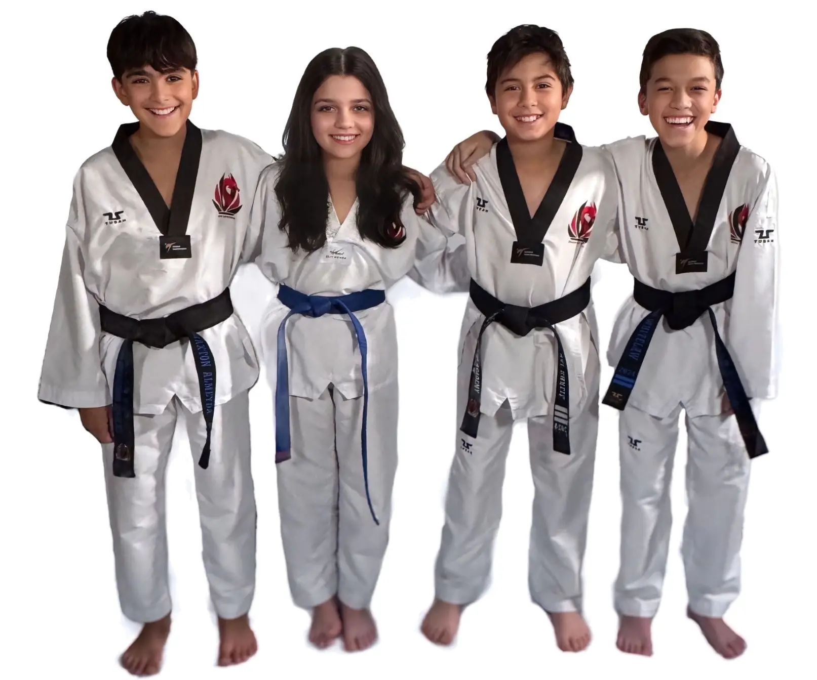Four Dragon Taekwondo students with coloured belts, arms around each other