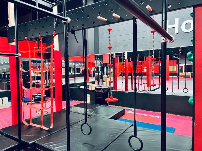 Rings and a cargo net on the Oakville ninja course